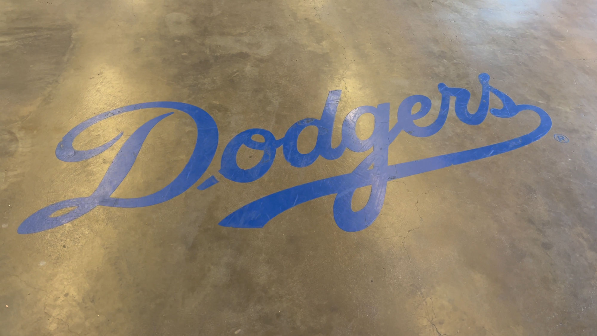 Logos Dodgers on Concrete