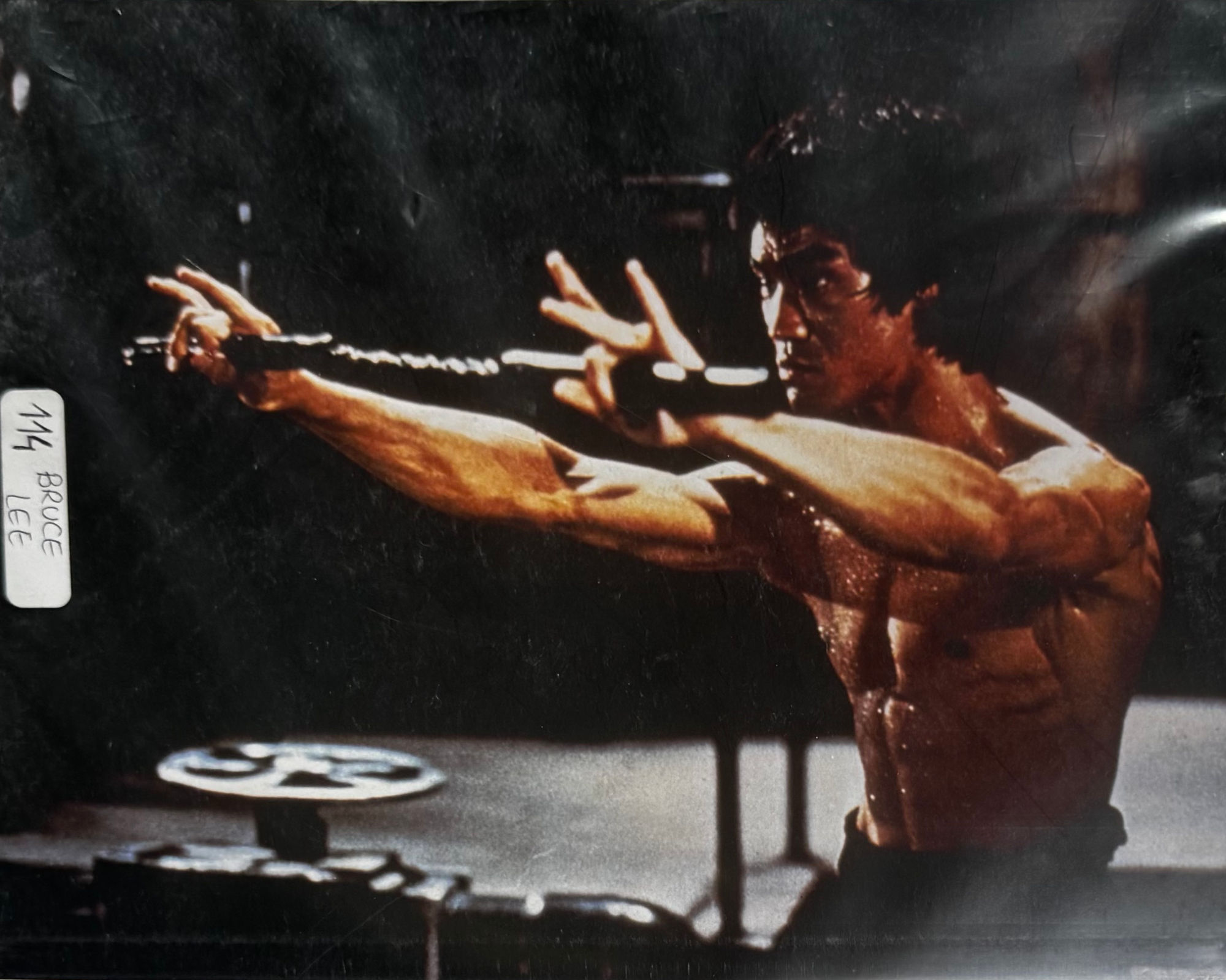 Photo Bruce Lee with nunchucks