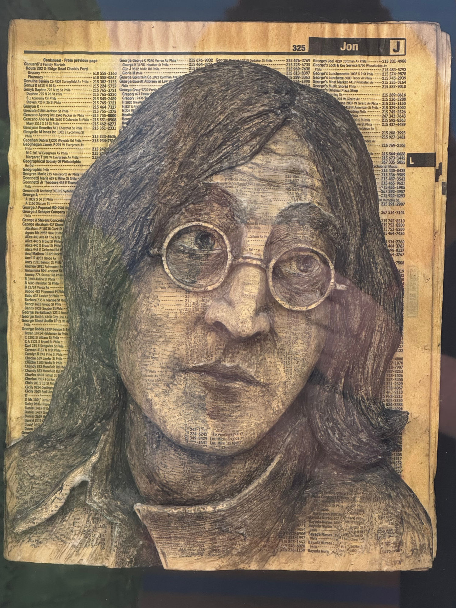 Ripley's Telephone Book Carving John Lennon