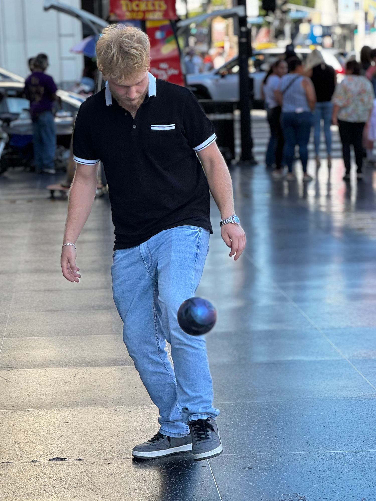 Sidewalk Football Kick-Ups