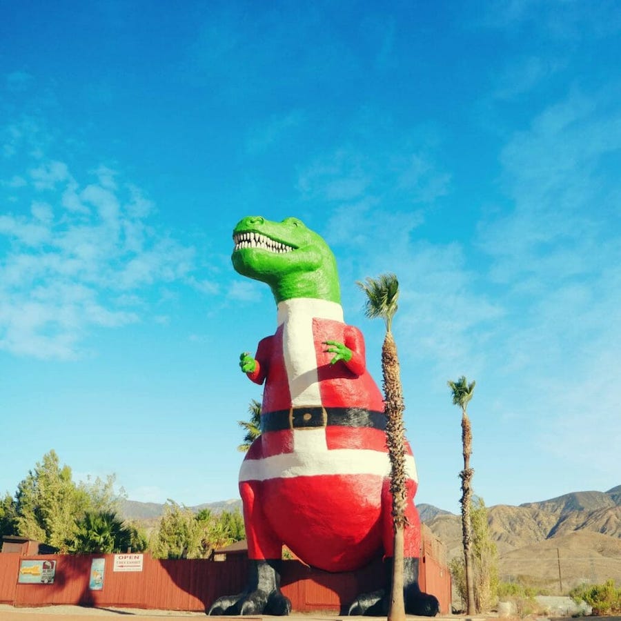 Cabazon Dinosaurs Painted for Christmas