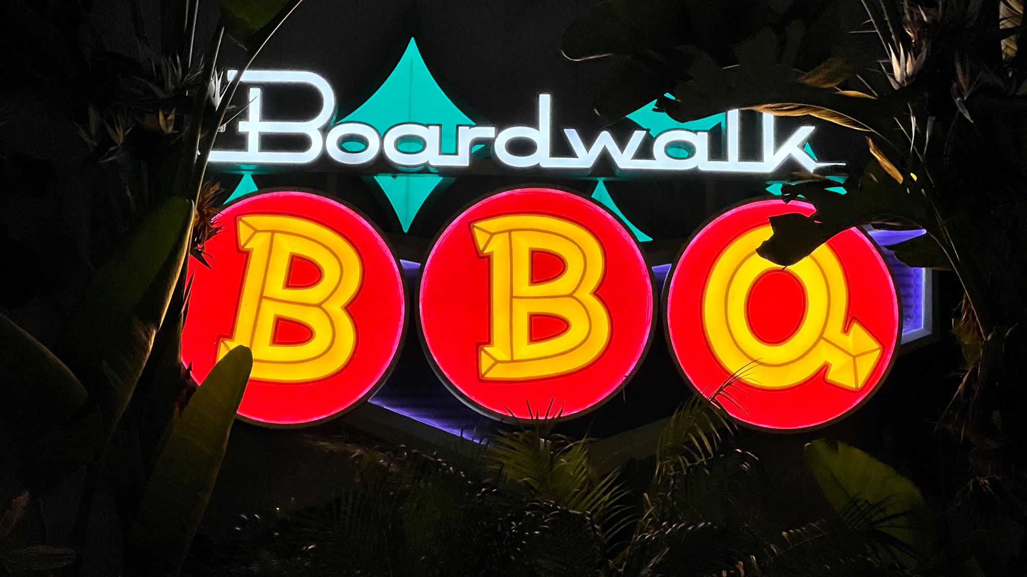 Boardwalk BBQ Sign at Night