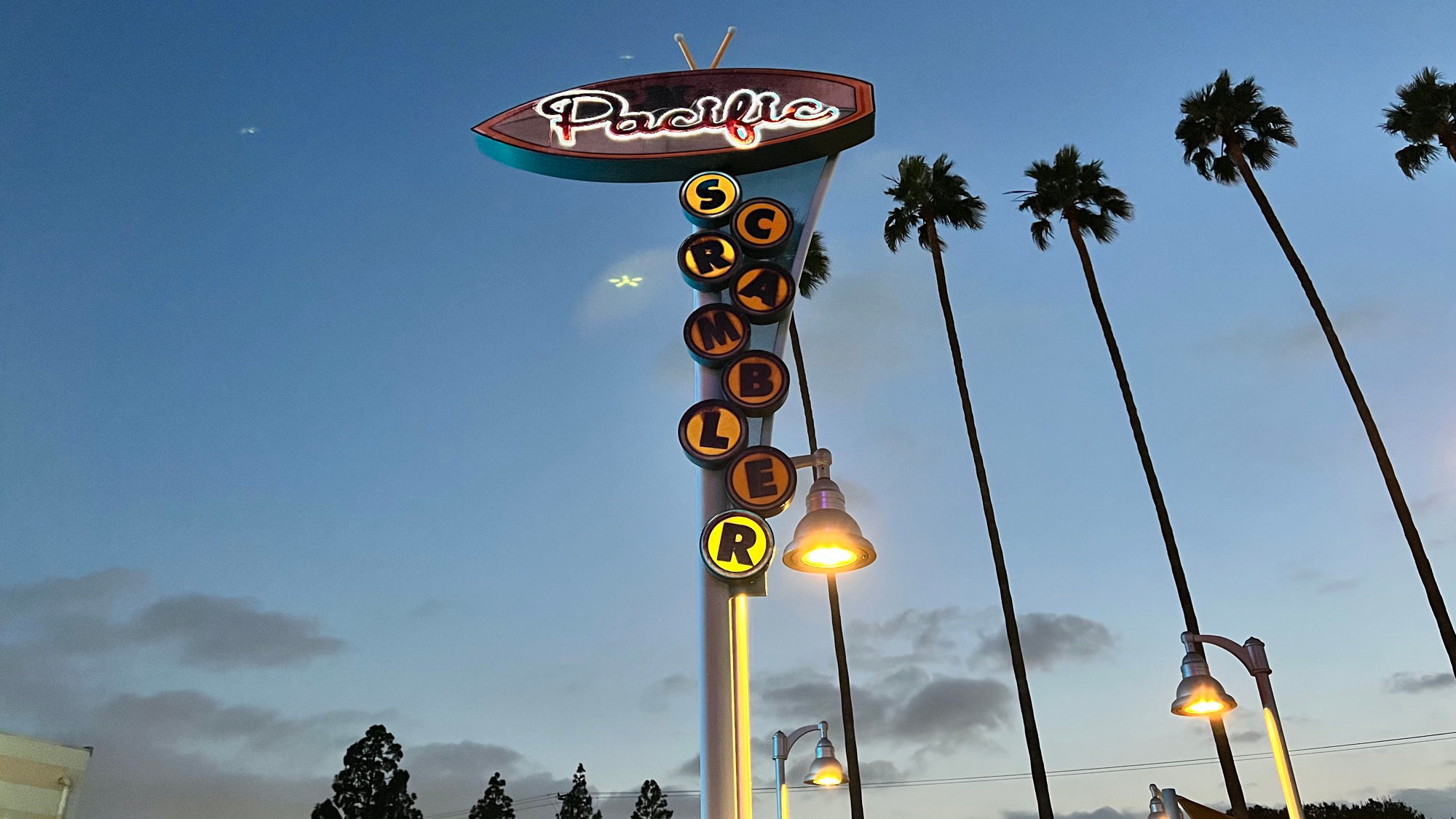 Pacific Scrambler Sign at Night
