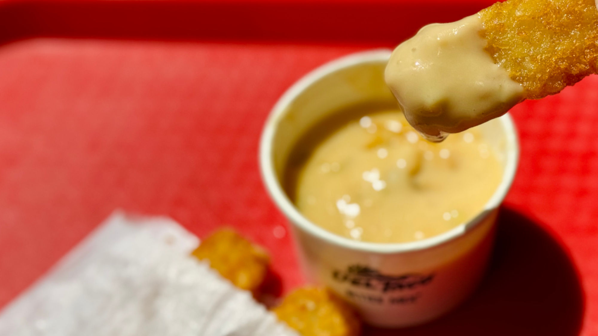 Del Taco Dip Hashbrowns in Queso