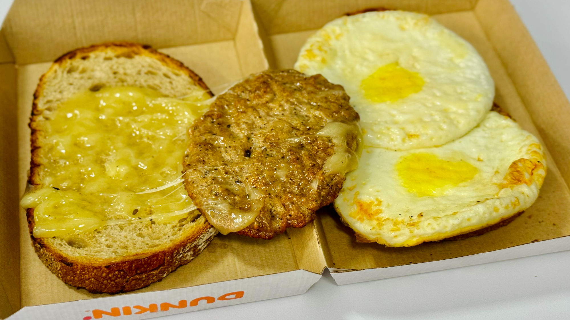 Dunkin' Sausage Sourdough Breakfast Sandwich