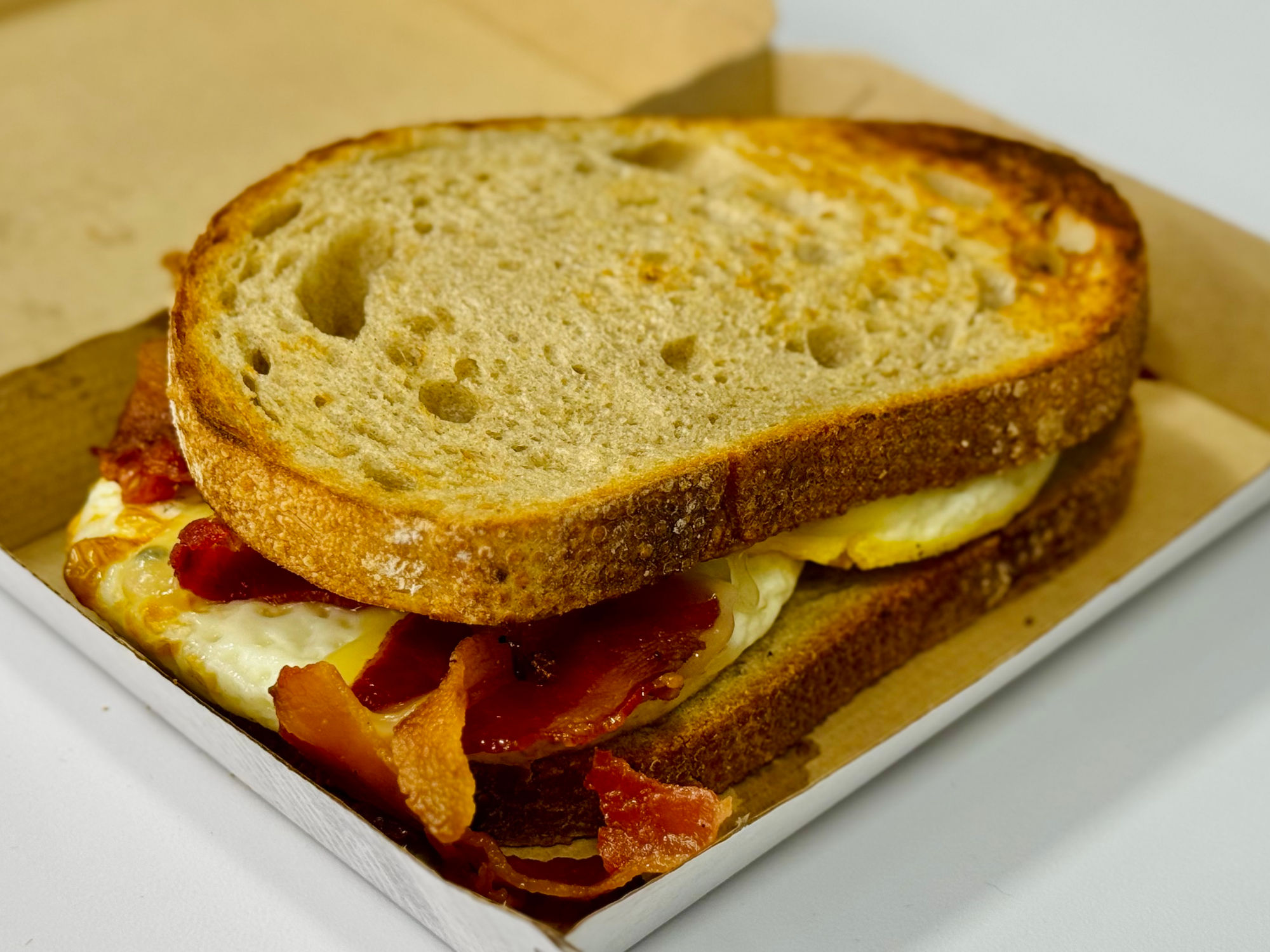 Dunkin' Sourdough Breakfast Sandwich with Maple Sugar Bacon