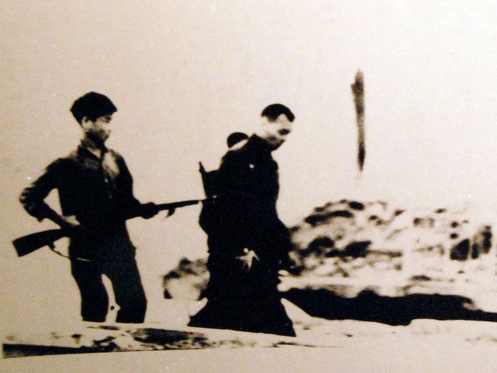 North Vietnamese Holds American POW